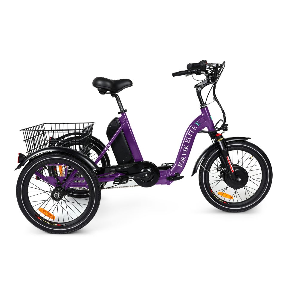 Bright purple step through adult tricycle with large metal basket between the two rear wheels. All three wheels have black fenders. There is a light on the handlebars.
